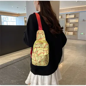 Back view of a women's nylon chest bag featuring a vibrant baseball pattern