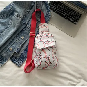 Detailed view of nylon chest bag with baseball print and vibrant red shoulder strap