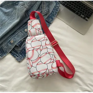 Close-up of nylon chest bag featuring a vibrant red baseball print and strap.
