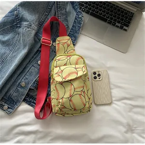 Yellowish nylon sling bag with red baseball pattern and adjustable red shoulder strap