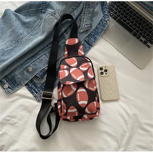 Detail shot of the nylon football pattern sling bag on a bed with lifestyle props