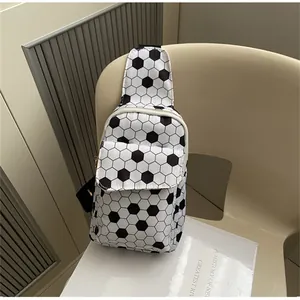 Detailed close-up of a nylon chest bag with soccer pattern on a minimalist chair