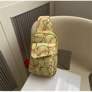 Detailed view of baseball print nylon crossbody chest bag on a chair
