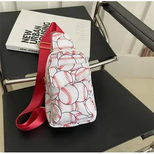 Nylon chest bag with baseball pattern and vibrant red strap on a modern chair
