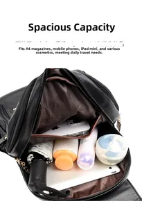 Detailed interior view of a large capacity black leather backpack showing storage space