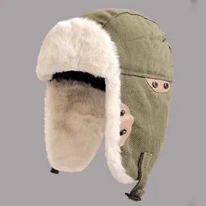 Insulated winter trapper hat in olive green with white faux fur lining and ear flaps