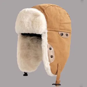 Brown trapper hat with white faux fur lining and ear flaps for winter