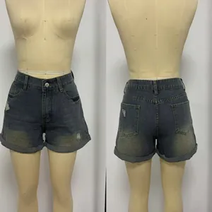 Detailed front and back views of high-waisted distressed denim shorts on mannequin