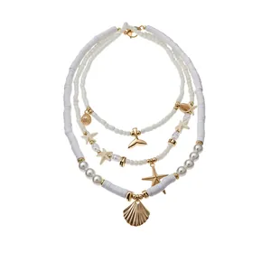 Bohemian style multi-layer necklace with starfish shell charms and elegant white pearls