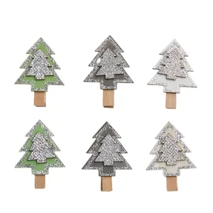 Set of six festive wooden Christmas tree clips with silver glitter in green, grey, and white