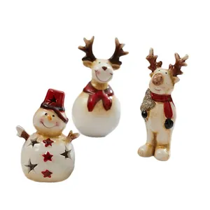 Vintage ceramic Christmas figurines set featuring LED snowman and reindeer for festive tabletop decor