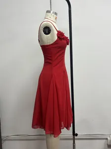Side profile view of an elegant red midi evening dress with 3D floral bust details
