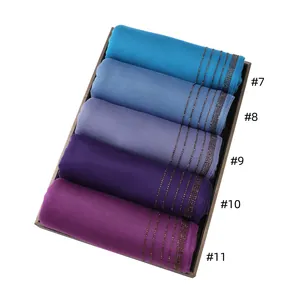 Macro detail of elastic mercerized cotton scarves with shimmering diamond stripes