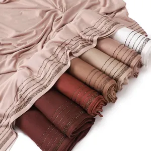 Solid color mercerized cotton jersey hijab with parallel rows of rhinestone accents