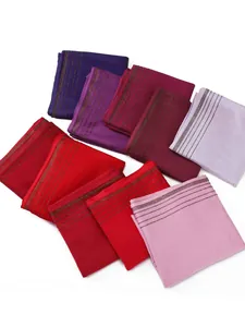 Close-up of folded jersey cotton hijabs with elegant rows of heat-set diamond beads
