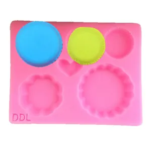 Pink silicone dessert mold with heart and round shapes for DIY macaron and cake baking