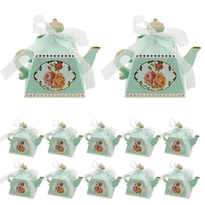 Teapot shaped paper gift boxes with floral rose pattern and white ribbon for parties