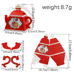 Elegant red teapot-shaped paper gift box with gold foil accents and floral design