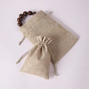 Set of natural burlap drawstring pouches for jewelry packaging and gift storage