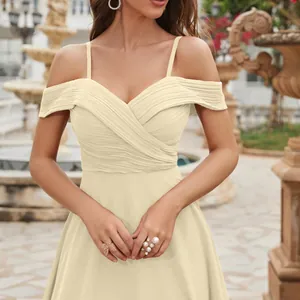 Elegant long off-shoulder champagne chiffon evening prom dress with pleated bodice.