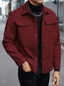 Stylish men's burgundy winter wool lapel jacket with dual chest pockets shown on model