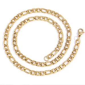 Detail of gold stainless steel Figaro chain necklace with lobster clasp for men