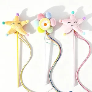 Set of three colorful plush starfish and sunflower fairy cat teaser wands with bells