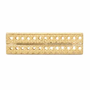 Side detail view of a vintage woven rattan and clear acrylic evening clutch bag with gold hinge