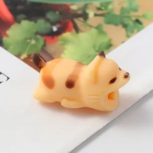Close-up of a cute orange cat silicone cable protector for charging data lines