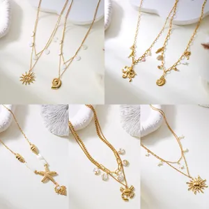 Bohemian gold stainless steel double-layer necklaces with sea shell and sun pendants.
