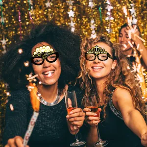 Black and gold New Year paper glasses party photo props for festive celebrations