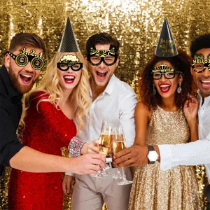 Set of 2027 New Year party paper glasses and gold cone hats for festive photo props