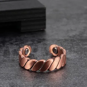 Retro magnetic red copper open ring featuring a vintage braided twisted design for wellness