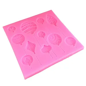 Rosa Silikonform mit verschiedenen Weihnachtskugel- und Ballonformen für DIY-Backen