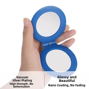 Detail of blue folding pocket mirror with vacuum silver plating and nano-spray finish