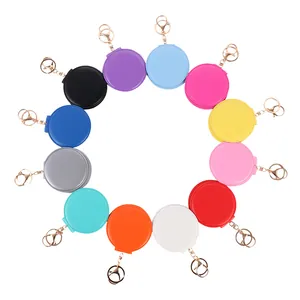 Portable PVC folding makeup mirror keychain available in twelve vibrant colors
