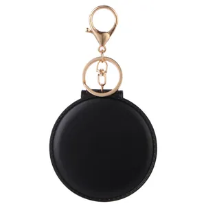 Portable round black PU leather keychain pocket mirror with golden metal clasp