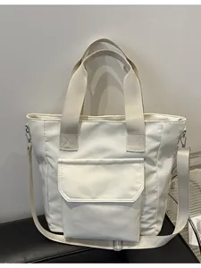 Elegant white nylon tote bag for women featuring large capacity and detachable strap