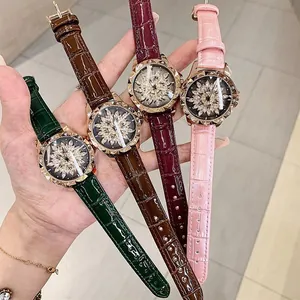 Detail of rose gold ladies' watch showing 4 colors and 3D floral crystal dial