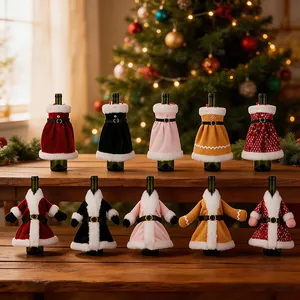 Collection of ten plush Christmas wine bottle covers in dress and coat styles