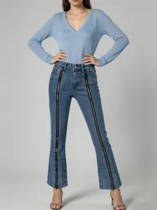 Stylish women's flare jeans with dual front zipper design in light blue