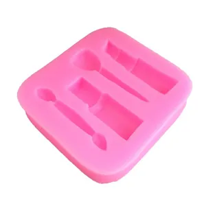 Pink silicone makeup tool mold with lipstick and nail polish shapes for fondant DIY