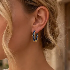 Elegant 18K gold plated hoop earrings featuring rectangular blue zircon stones