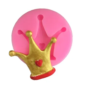 DIY pink crown-shaped silicone mold for fondant and resin crafts with golden sample