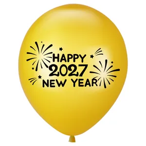 Detail of yellow party balloon featuring Happy 2027 New Year print and fireworks