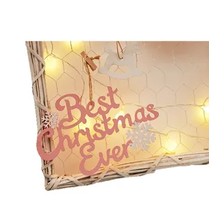 Creative DIY Christmas wall decoration kit featuring wooden frame and warm LED string lights