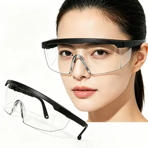 Clear protective safety goggles with black frame for impact and splash protection