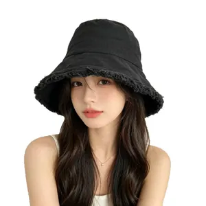 Fashionable black washed cotton bucket hat with frayed edges for women sun protection
