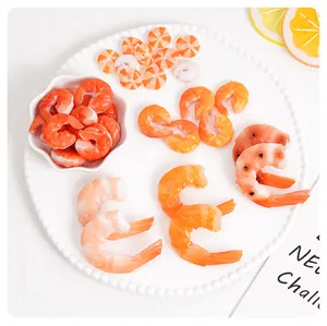 Macro detail of artificial PVC shrimp models in a bowl for food photography props