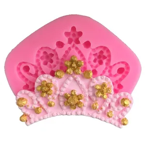 Pink crown-shaped silicone mold for DIY cake decorating, chocolate, and plaster crafts